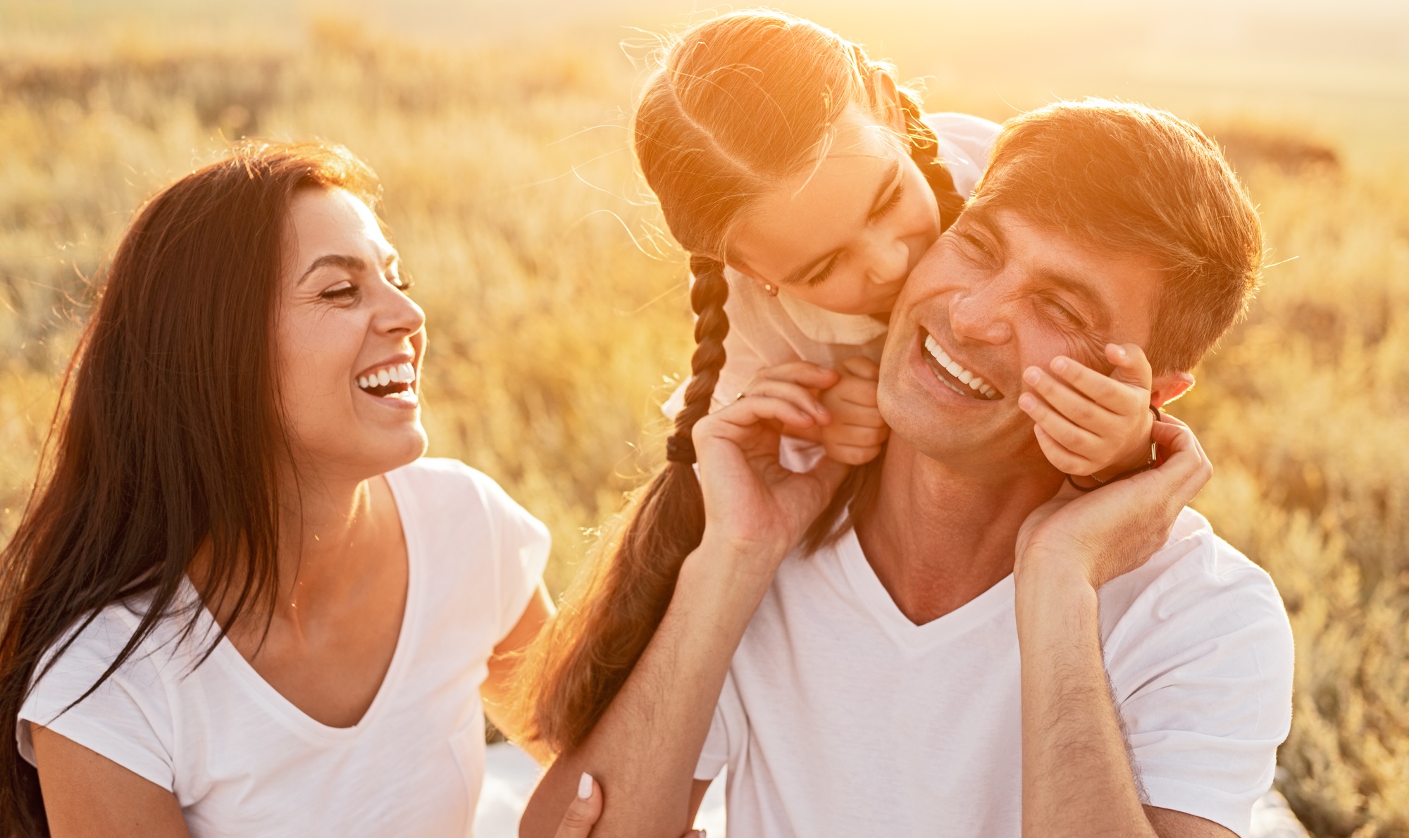 Happy family spending time in nature, brain tumour support for families