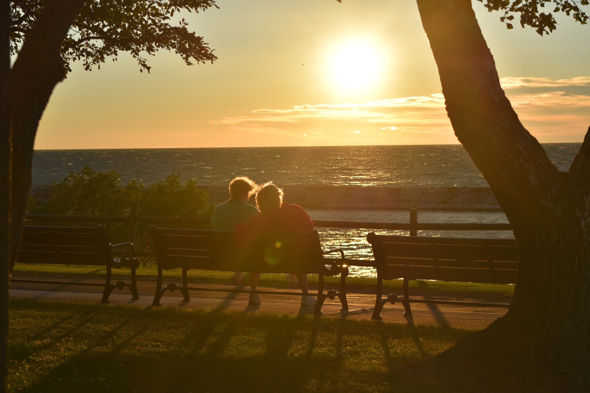 Enjoying the sunset with a loved one next to Lake Ontario